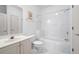 Bathroom featuring a vanity and a shower-tub combo with tile surround at 1605 Ridenour Nw Pkwy, Kennesaw, GA 30152