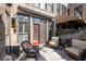 Cozy outdoor patio features comfortable seating and brick accents at 1605 Ridenour Nw Pkwy, Kennesaw, GA 30152