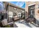 Private patio area includes comfortable seating and a stone patio at 1605 Ridenour Nw Pkwy, Kennesaw, GA 30152