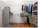 Organized walk-in closet featuring shelving, hanging racks, and ample storage space at 1605 Ridenour Nw Pkwy, Kennesaw, GA 30152