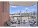 Balcony features seating and an open cityscape view at 3435 Kingsboro Ne Rd # 1701, Atlanta, GA 30326