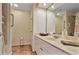 Bathroom features a well-lit mirror, stylish vanity, and walk-in shower for a spa-like experience at 3435 Kingsboro Ne Rd # 1701, Atlanta, GA 30326