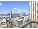 City view from balcony features high-rise buildings and bustling city life at 3435 Kingsboro Ne Rd # 1701, Atlanta, GA 30326