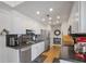 Bright kitchen featuring white cabinetry, dark countertops, and stainless steel appliances at 3435 Kingsboro Ne Rd # 1701, Atlanta, GA 30326