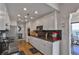 Modern kitchen with white cabinets, stone countertops, and stainless steel appliances at 3435 Kingsboro Ne Rd # 1701, Atlanta, GA 30326