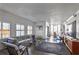 Bright living room featuring hardwood floors, large windows, and modern furnishings, perfect for relaxation and entertaining at 3435 Kingsboro Ne Rd # 1701, Atlanta, GA 30326
