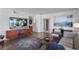 Cozy living room with hardwood flooring, modern decor, and artful touches at 3435 Kingsboro Ne Rd # 1701, Atlanta, GA 30326