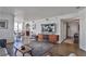 Living room showcasing hardwood floors and open-concept design leading to the dining area at 3435 Kingsboro Ne Rd # 1701, Atlanta, GA 30326