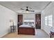Spacious main bedroom with built-in bookcases and a comfortable queen-size bed at 3435 Kingsboro Ne Rd # 1701, Atlanta, GA 30326
