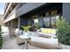 Relaxing outdoor balcony featuring stylish furniture and lush greenery for comfortable lounging at 567 Ponce De Leon Ne Ave # 317, Atlanta, GA 30308