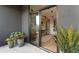 View from the balcony into the living area with a modern kitchen and open floorplan at 567 Ponce De Leon Ne Ave # 317, Atlanta, GA 30308