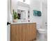 Well-lit bathroom with light wood vanity, modern fixtures, and a clean, stylish design at 567 Ponce De Leon Ne Ave # 317, Atlanta, GA 30308
