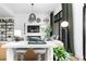 Chic living area with stylish decor, a comfortable seating area, and plenty of natural light from the windows at 567 Ponce De Leon Ne Ave # 317, Atlanta, GA 30308