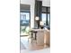 Cozy living room nook with bar table with seating, offering a relaxing view outside the window at 567 Ponce De Leon Ne Ave # 317, Atlanta, GA 30308
