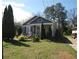 Quaint bungalow-style home with well-manicured lawn and charming architectural details at 998 Sparks Sw St, Atlanta, GA 30310
