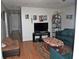 Functional living room with neutral walls, hardwood floors, and a comfortable seating arrangement at 998 Sparks Sw St, Atlanta, GA 30310