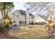 Spacious backyard features a well-maintained lawn, patio, and mature trees, perfect for outdoor entertaining at 1224 Indian Hills Pkwy, Marietta, GA 30062