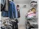 Walk-in closet with organized shelving and ample storage space at 1224 Indian Hills Pkwy, Marietta, GA 30062