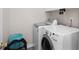 Convenient laundry room featuring a modern washer and dryer set and organized storage at 1224 Indian Hills Pkwy, Marietta, GA 30062