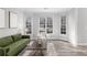Bright living room featuring a bay window, neutral walls, and stylish furnishings at 1224 Indian Hills Pkwy, Marietta, GA 30062