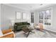 Cozy living room with large windows, neutral decor, and comfortable seating at 1224 Indian Hills Pkwy, Marietta, GA 30062
