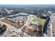 Aerial view of a modern school complex with athletic fields, playgrounds, and a safe learning environment at 1224 Indian Hills Pkwy, Marietta, GA 30062