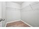 Walk-in closet with wire shelving and light-colored wood-look flooring at 1241 To Lani Path, Stone Mountain, GA 30083
