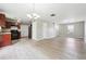 Open concept living area featuring stylish floors connecting the living room to the kitchen at 1241 To Lani Path, Stone Mountain, GA 30083