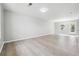 Spacious living room with modern flooring, neutral walls, and ample natural light at 1241 To Lani Path, Stone Mountain, GA 30083