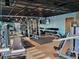Large fitness center with free weights and weight machines, treadmills, and televisions at 361 17Th Nw St # 1021, Atlanta, GA 30363
