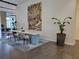 Modern lobby with a long table, chairs, and a large art piece, creating a welcoming space at 361 17Th Nw St # 1021, Atlanta, GA 30363