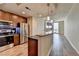 Modern kitchen features stainless steel appliances, stylish countertops, and a breakfast bar at 361 17Th Nw St # 1021, Atlanta, GA 30363