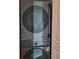 Modern black Samsung stackable washer and dryer at 361 17Th Nw St # 1021, Atlanta, GA 30363