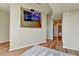 Comfortable living room with wood floors and a mounted flat screen television at 361 17Th Nw St # 1021, Atlanta, GA 30363