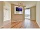 Open-concept living room with hardwood floors, and city views at 361 17Th Nw St # 1021, Atlanta, GA 30363