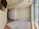Bright living room featuring hardwood floors and large windows with city views at 361 17Th Nw St # 1021, Atlanta, GA 30363