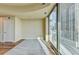 Bright living room featuring hardwood floors and large windows with city views at 361 17Th Nw St # 1021, Atlanta, GA 30363