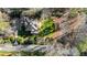 Aerial view of landscaped property showing well-maintained yard, stone pathway, and mature trees at 3051 Habersham Nw Rd, Atlanta, GA 30305