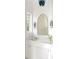 Stylish bathroom features a vanity with a white countertop and crystal sconces at 3051 Habersham Nw Rd, Atlanta, GA 30305