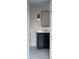 Charming bathroom features a blue vanity and patterned tile flooring at 3051 Habersham Nw Rd, Atlanta, GA 30305