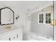 Elegant bathroom featuring stylish tile, glass-enclosed shower, and modern fixtures at 3051 Habersham Nw Rd, Atlanta, GA 30305
