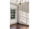 Bedroom with built-in wardrobe and drawers and a large window at 3051 Habersham Nw Rd, Atlanta, GA 30305