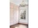 Bedroom featuring a chandelier, large window, and built-in cabinetry at 3051 Habersham Nw Rd, Atlanta, GA 30305