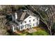 Elegant home with a well-manicured lawn and a distinctive architectural design and many windows at 3051 Habersham Nw Rd, Atlanta, GA 30305