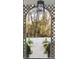 Inviting front entryway with beautiful decorative details and mature landscaping at 3051 Habersham Nw Rd, Atlanta, GA 30305