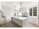 Bright kitchen with marble countertops, large island, and stainless steel appliances at 3051 Habersham Nw Rd, Atlanta, GA 30305