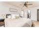 This spacious bedroom features a ceiling fan, neutral walls, and a walk-in closet at 3529 Essex Ave # 75, Atlanta, GA 30339