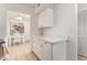 Well-maintained kitchen with white countertops and cabinetry, conveniently located near the dining area at 3529 Essex Ave # 75, Atlanta, GA 30339