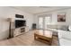 Inviting living room with French doors, a sectional couch, and stylish decorations at 3529 Essex Ave # 75, Atlanta, GA 30339