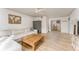 Bright living room featuring a comfortable sectional, light wood floors, and modern decor at 3529 Essex Ave # 75, Atlanta, GA 30339
